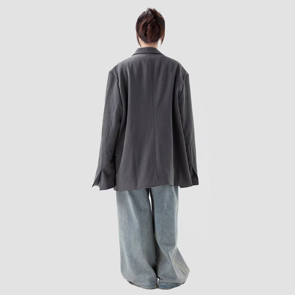 Gray coat back view with long sleeves and relaxed fit