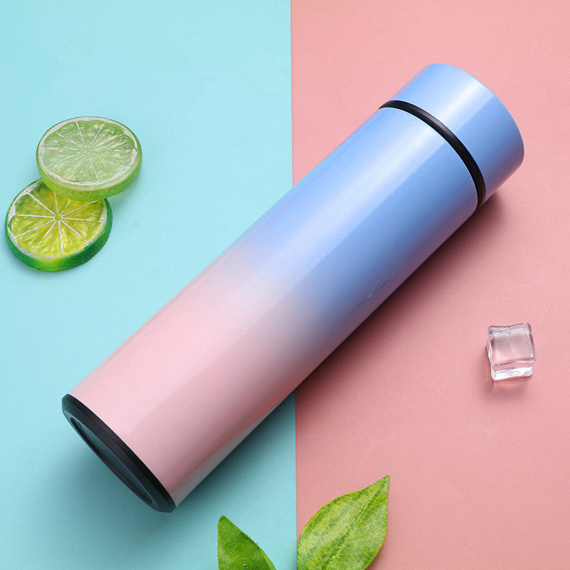 Vacuum insulated stainless steel bottle cup, pink to blue gradient with black rim and lid
