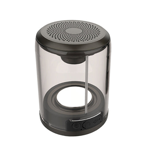 Bluetooth speaker with transparent cylinder body and black top grille, magnetic base