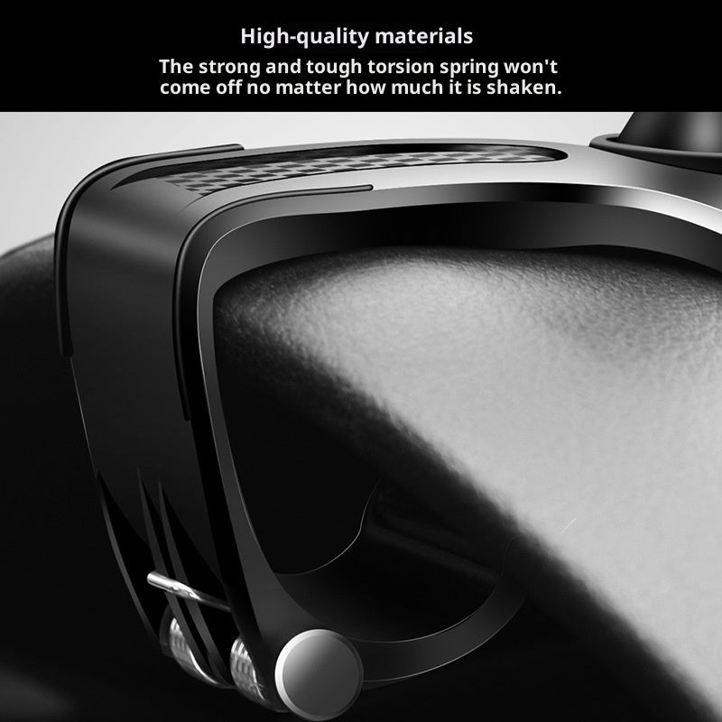 Black spring clamp phone holder with adjustable side arms and textured grip pad.