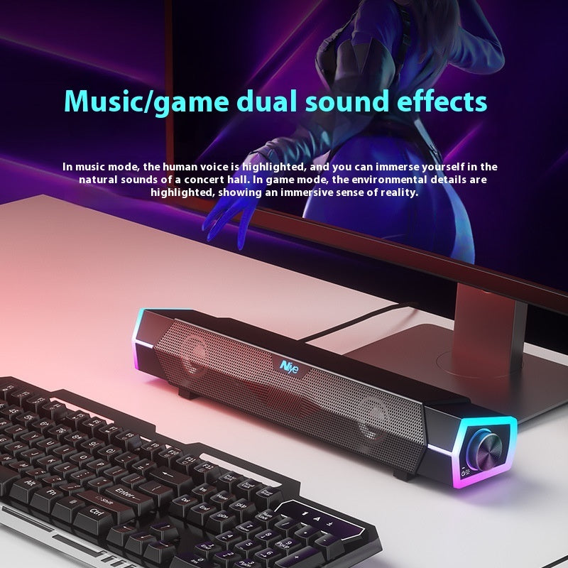 Black Bluetooth soundbar speaker with mesh grille, cyan LED accents, front volume dial