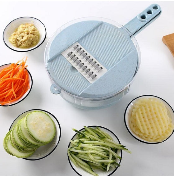 Mandoline slicer with round grating drum and side handle, blue with blade insert