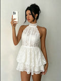 White lace halter short dress with tiered skirt and open back, front view