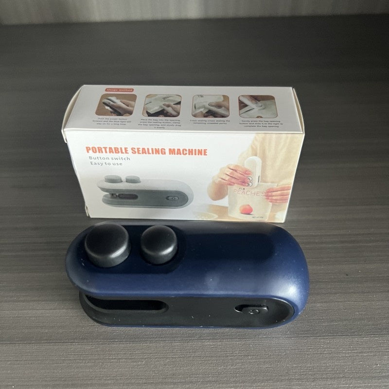 Blue portable sealing machine on display with included product box