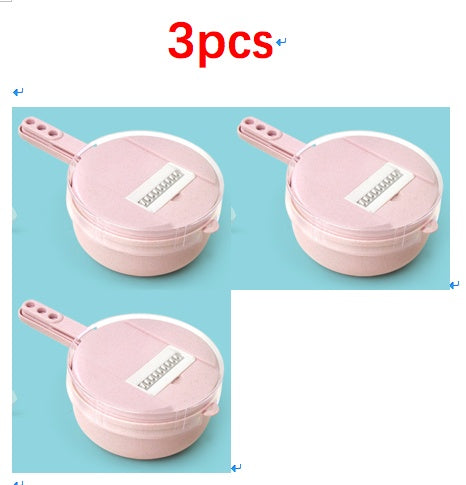 Pink mandoline slicer kit with round grating drum and side handle, three pieces