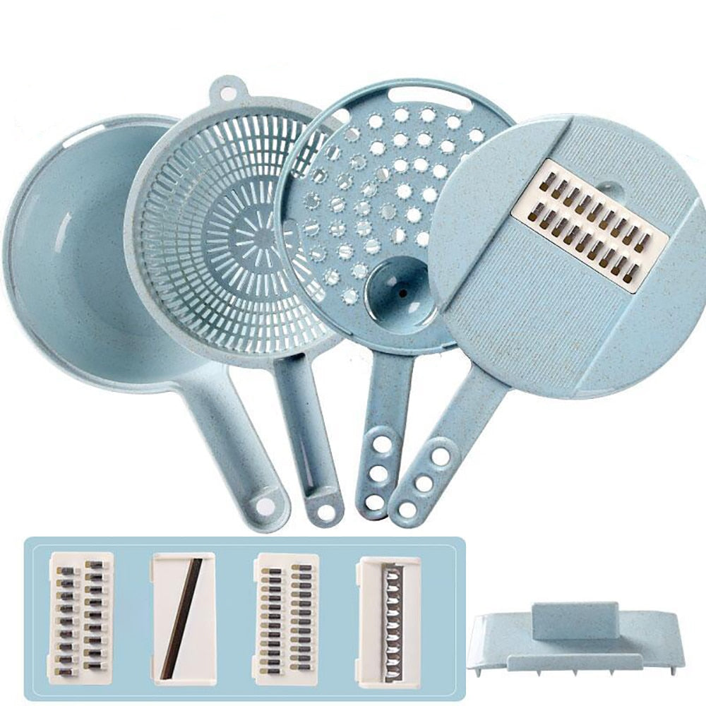 Set of mandoline slicer attachments, including grating plates, basket, and lid pieces.
