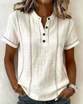 Women’s striped short-sleeve blouse, white with dark vertical stitching, button V-neck placket