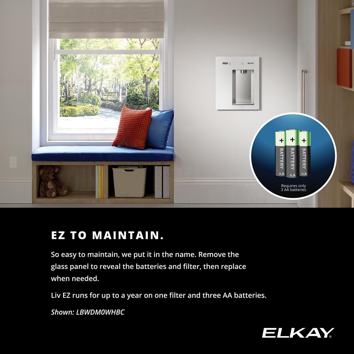 White wall-mounted water dispenser, installed on a home wall with a circular control button