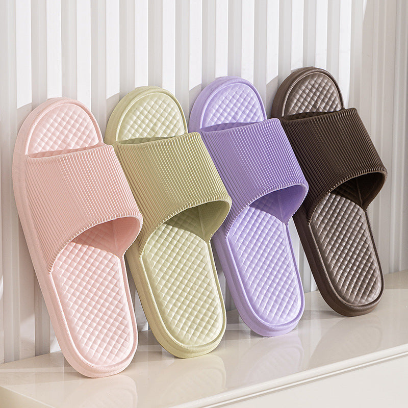 Pastel slip-on house slippers, striped uppers and textured diamond footbeds