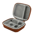 Brown leather earbud case with zipper, open top, gray inner compartments and mesh panel