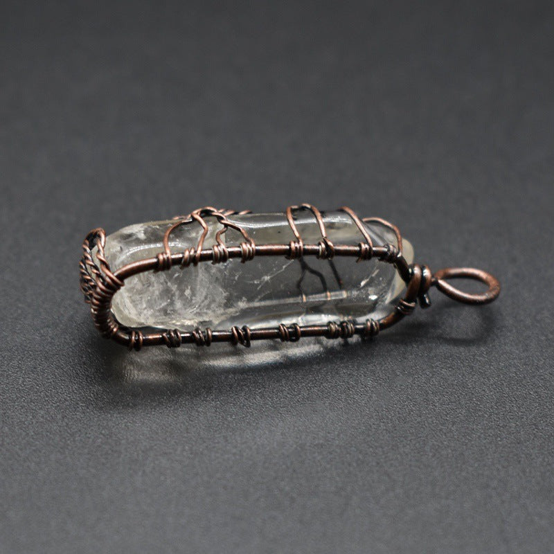 Clear crystal pillar bracelet with copper wire wrap and ring clasp