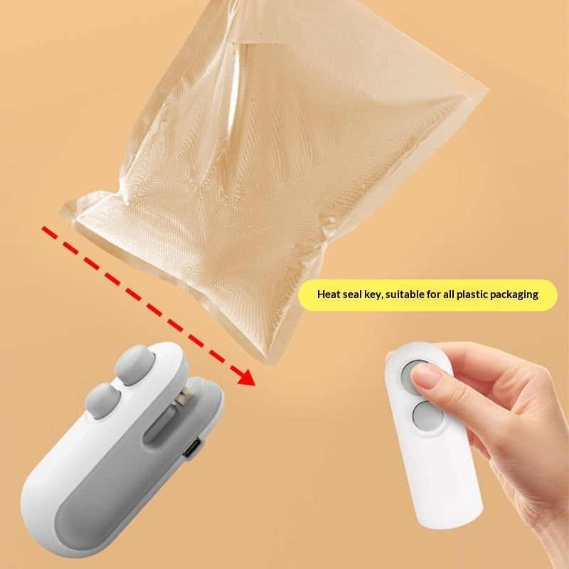 White portable heat sealer applying seal to a plastic bag