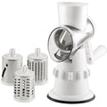 Front view of white 3-in-1 manual vegetable slicer with three grater drums
