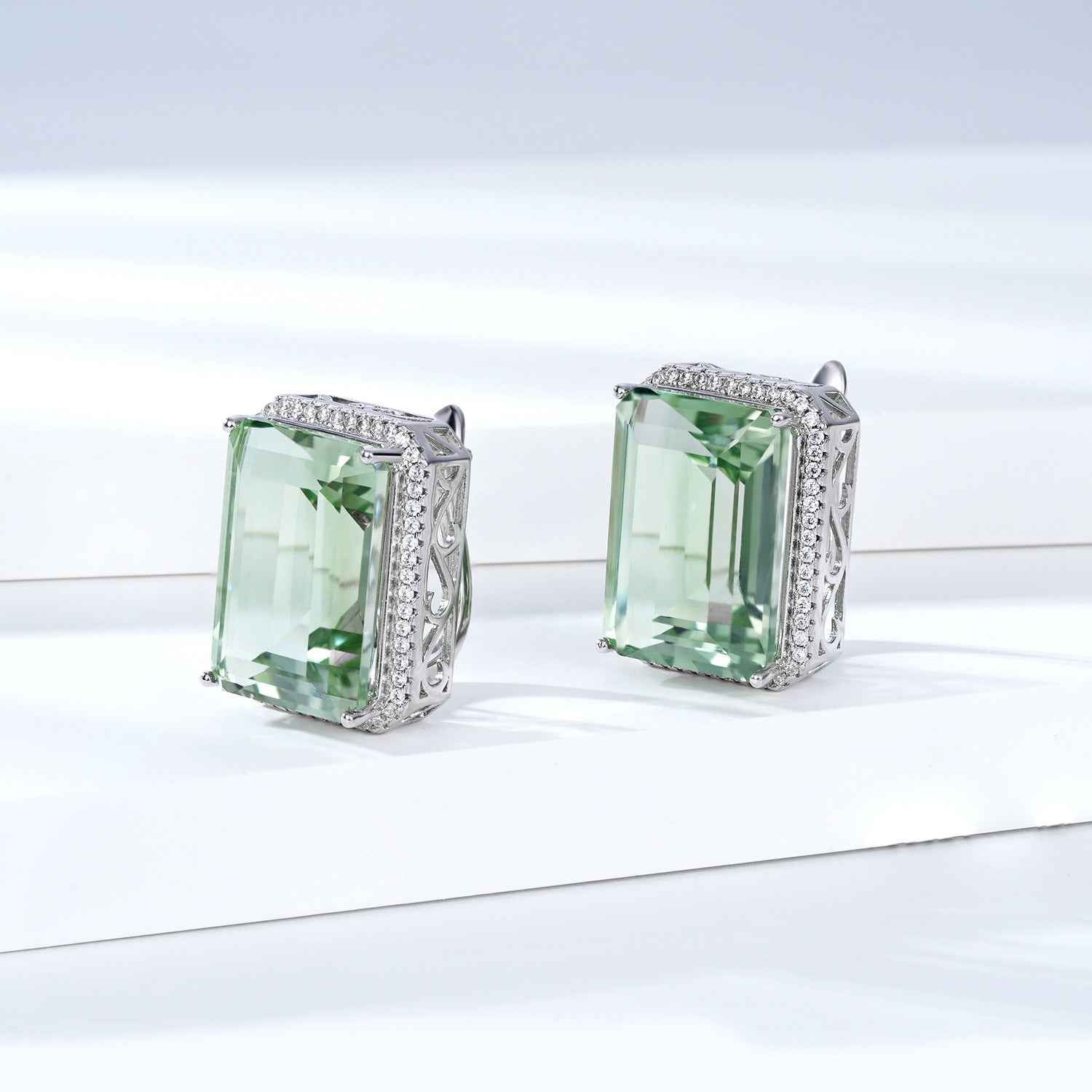Square green crystal stud earrings in S925 silver with prong-set rectangular frame