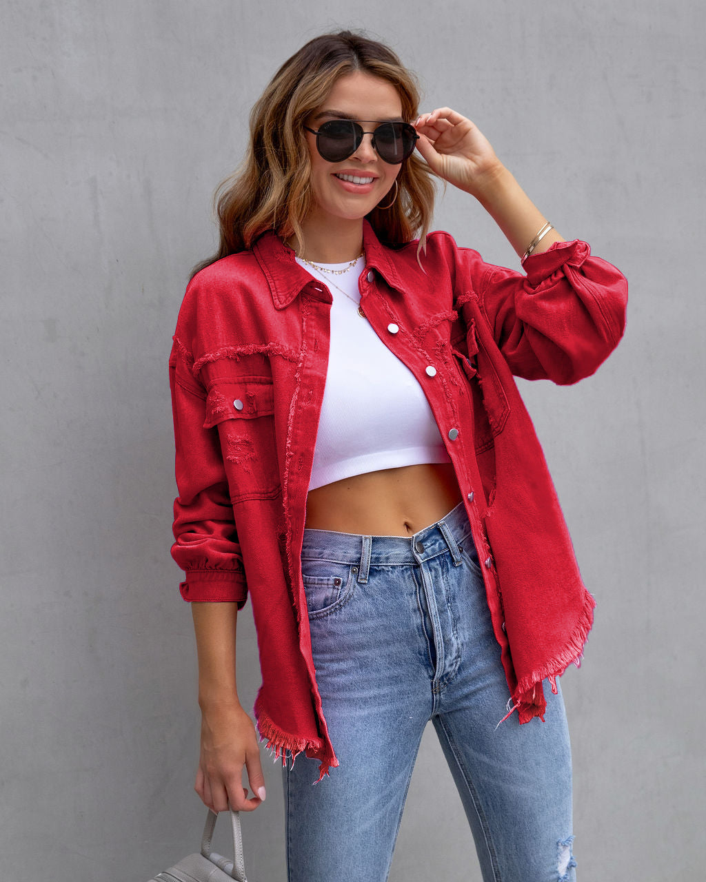 Red ripped denim shirt jacket with button front and chest pockets
