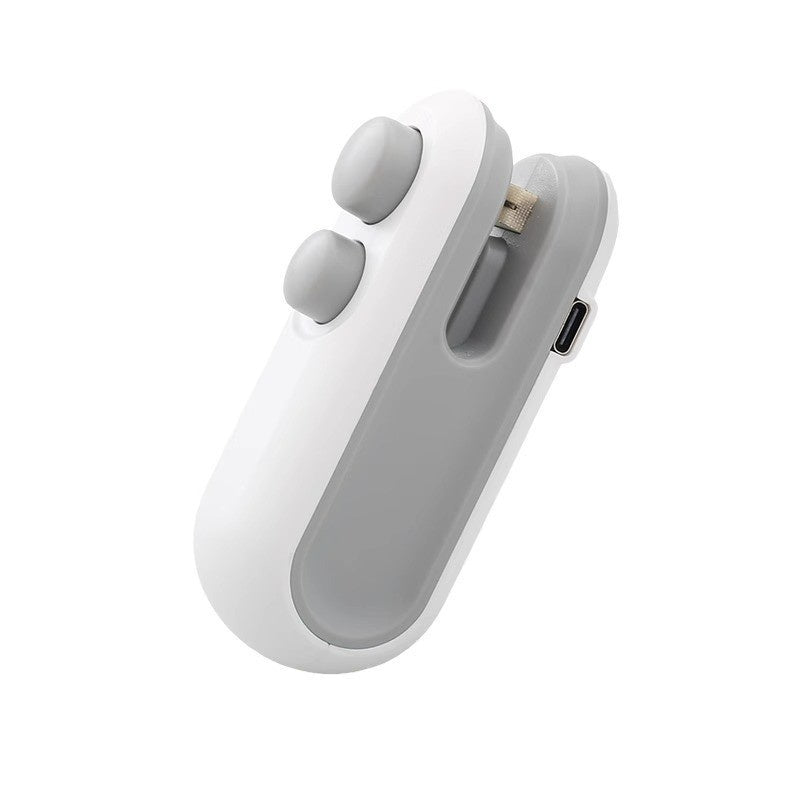 Gray and white handheld heat sealer with two large buttons