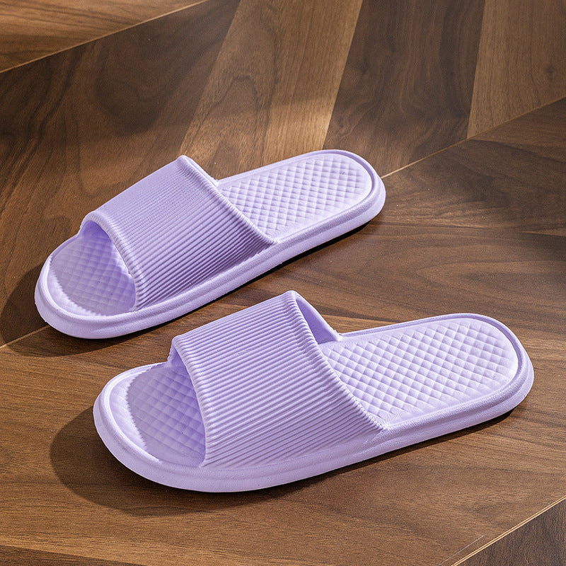 Purple slide slippers with striped upper and textured diamond footbed