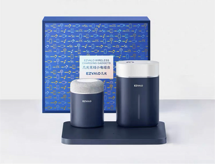 Wireless charging night light speaker set: two cylindrical speakers on base, dark blue accents